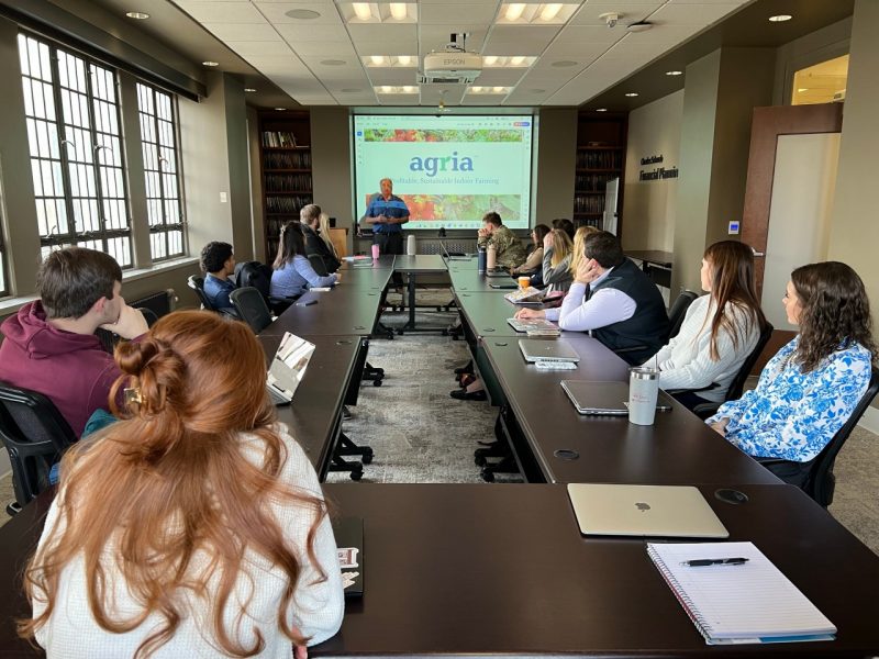 William Layton talks with Agri-Food Finance Fellows and faculty about Agria on January 31, 2025. Photo courtesy of Mario Ortez.